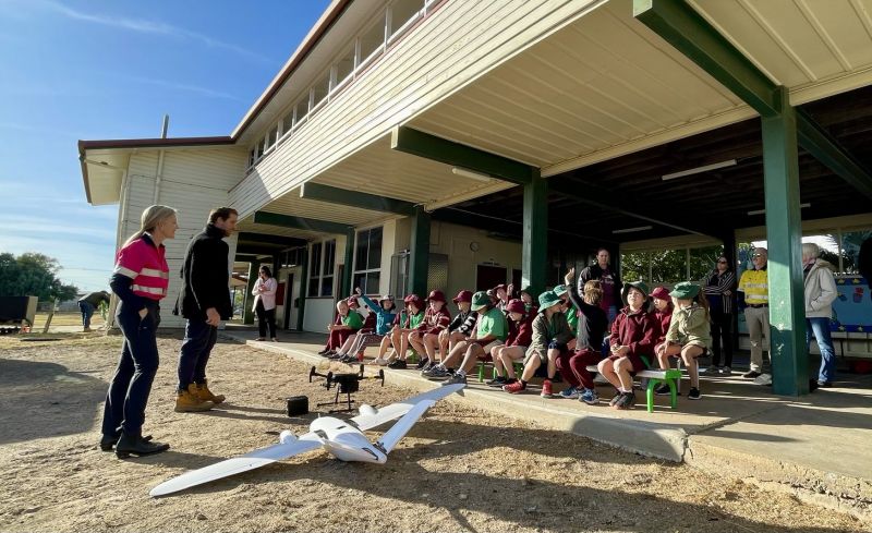 Joanne Bergamin, QEM Communications Director and Ben Harris, National Drones CEO conducting a presentation for the students of Julia Creek State School, including a free online drone course.